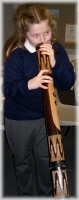 Playing the digeridoo