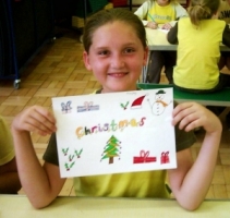 The winning placemat designer with her placemat