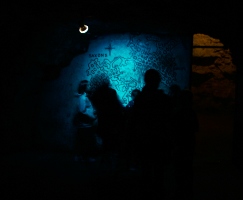 looking at the map at the cave entrance