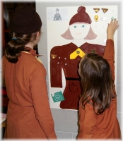 Pin the badge on the Brownie