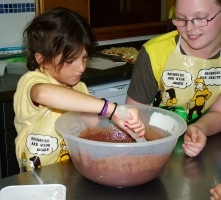 helping make the chocolate sponge